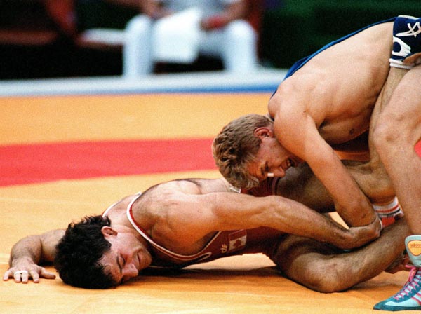 Canada's Chris Rinke (right) competing in the wrestling event at the 1988 Olympic games in Seoul. (CP PHOTO/ COA/ Cromby McNeil)