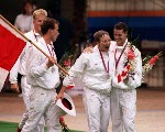 (from left) Canada's Tom Ponting, Sandy Goss and Victor Davis celebrate their silver medal win in the men's IM swimming event at the 1988 Olympic games in Seoul. (CP PHOTO/ COA/ Cromby McNeil)