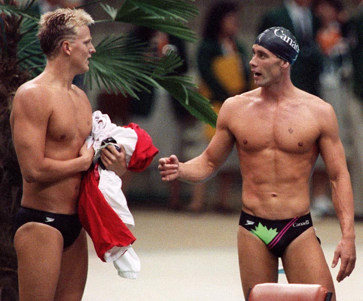 Canada's Sandy Goss (left) and Victor Davis competing in the swimming event at the 1988 Olympic games in Seoul. (CP PHOTO/ COA/ Cromby McNeil)