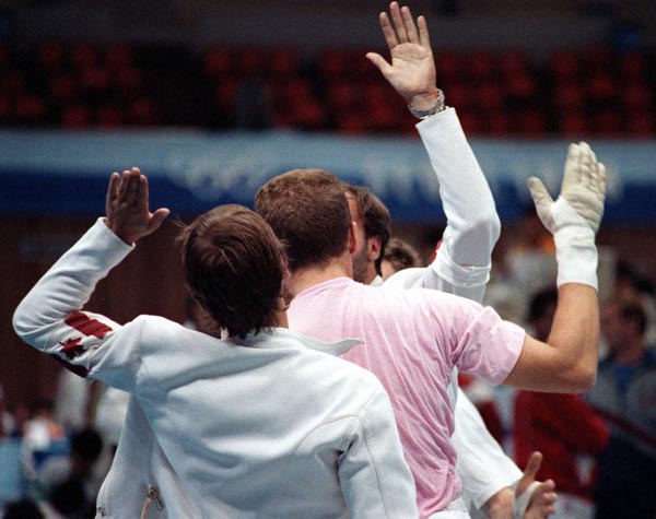 Canada's fencing team members celebrate at the 1988 Olympic games in Seoul. (CP PHOTO/ COA/T.O'Lett )