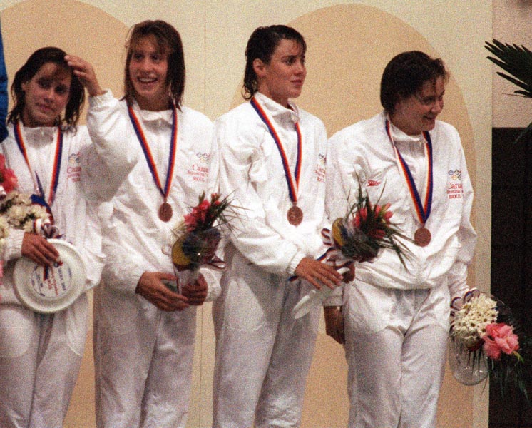 Canada's Lori Melien, Allison Higson, Jane Kerr and Andrea Nugent celebrate their bronze medal win in the women's IM swimming event at the 1988 Olympic games in Seoul. (CP PHOTO/ COA/ Ted Grant)