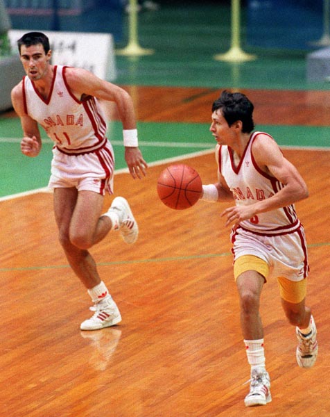 Canada's John Hatch (left) and Eli Pasquale competing in the basketball event at the 1988 Olympic games in Seoul. (CP PHOTO/ COA/ F. Scott Grant)