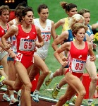 Canada's Angela Chalmers (#65) and Lynn Williams (#83) competing in the 3000m event at the 1988 Olympic games in Seoul. (CP PHOTO/ COA/F.S.Grant)