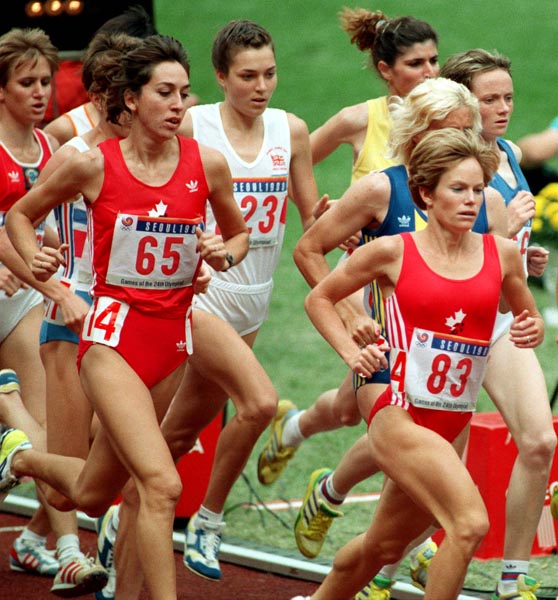 Canada's Angela Chalmers (65) and Lynn Williams (83) competing in the athletics event at the 1988 Olympic games in Seoul. (CP PHOTO/ COA/ Cromby McNeil)