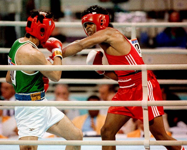 Canada's Raymond Downey (right) competing in the boxing event at the 1988 Olympic games in Seoul. (CP PHOTO/ COA/ S.Grant)