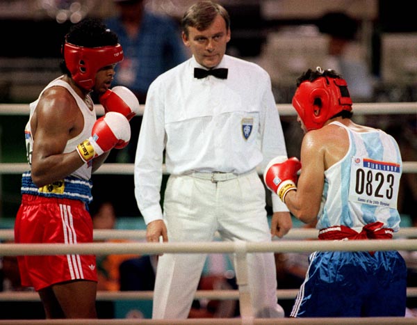 Canada's Raymond Downey (left) competing in the boxing event at the 1988 Olympic games in Seoul. (CP PHOTO/ COA/ S.Grant)