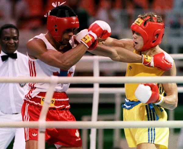 Canada's Howard Grant (left) competing in the boxing event at the 1988 Olympic games in Seoul. (CP PHOTO/ COA/ S.Grant)