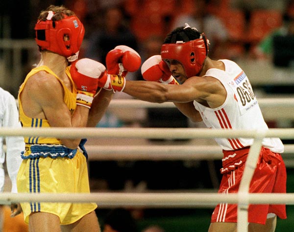 Canada's Howard Grant (right) competing in the boxing event at the 1988 Olympic games in Seoul. (CP PHOTO/ COA/ S.Grant)