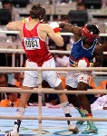 Canada's Egerton Marcus (right) competing in the boxing event at the 1988 Olympic games in Seoul. (CP PHOTO/ COA/ S.Grant)