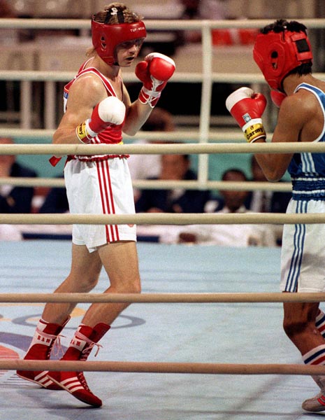 Canada's Jamie Pagendam (left) competing in the boxing event at the 1988 Olympic games in Seoul. (CP PHOTO/ COA/ S.Grant)