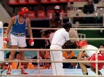 Canada's Tom Glesby (right) competing in the boxing event at the 1988 Olympic games in Seoul. (CP PHOTO/ COA/ S.Grant)