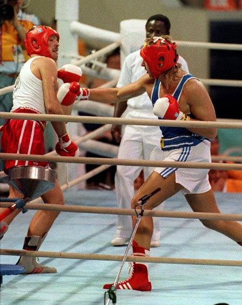 Canada's Tom Glesby (right) competing in the boxing event at the 1988 Olympic games in Seoul. (CP PHOTO/ COA/ S.Grant)