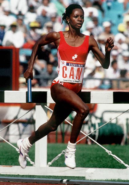 Canada's Marita Payne-Wiggins competing in the   4x400m relay event at the 1988 Olympic games in Seoul. (CP PHOTO/ COA/F.S.Grant)
