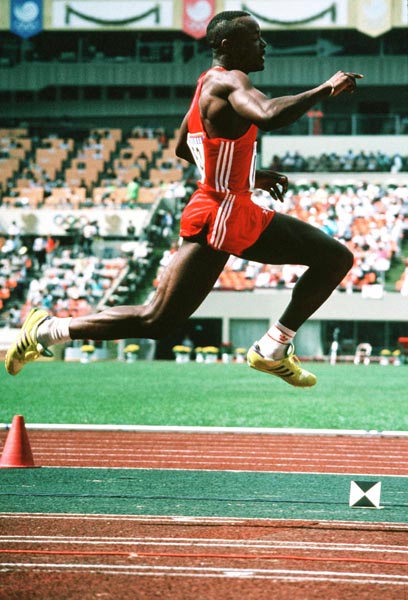 Canada's Edrick Floreal competing in the triple jump  event at the 1988 Olympic games in Seoul. (CP PHOTO/ COA/ F.S.Grant)