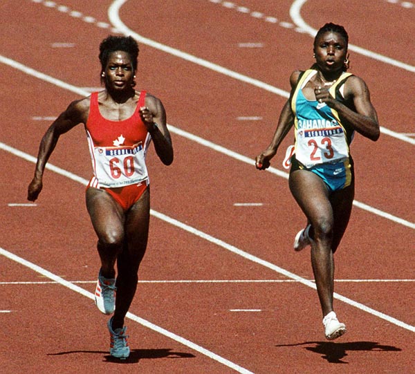 Canada's Angela Bailey (left) competing in the 100m  event at the 1988 Olympic games in Seoul. (CP PHOTO/ COA/F.S.Grant)