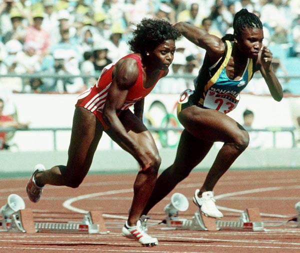 Canada's Angela Bailey (left) competing in the 100m  event at the 1988 Olympic games in Seoul. (CP PHOTO/ COA/F.S.Grant)