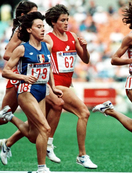 Canada's Debbie Bowker (right) competing in the 3000m  event at the 1988 Olympic games in Seoul. (CP PHOTO/ COA/F.S.Grant)