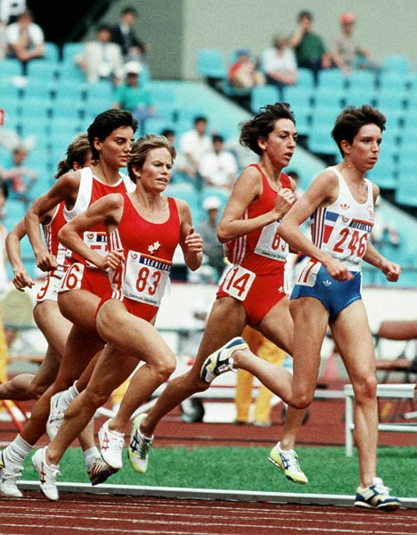 Canada's Lynn Williams (second from left) and Angela Chalmers (second from right) competing in the 3000m event at the 1988 Olympic games in Seoul. (CP PHOTO/ COA/F.S.Grant)