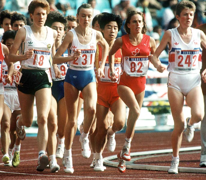 Canada's Nancy Tinari (#82) competing in the 10 000m event at the 1988 Olympic games in Seoul. (CP PHOTO/ COA/F.S.Grant)