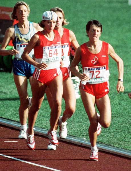 (From right to left) Canada's Odette Lapierre, Lizanne Bussieres (#64) and Ellen Rochefort competing in the marathon event at the 1988 Olympic games in Seoul. (CP PHOTO/ COA/F.S.Grant)