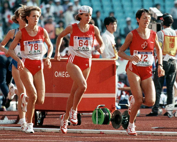 Canada's Ellen Rochefort (second from left), Odette Lapierre (#72) and Lizanne Bussieres (#64) competing in the marathon event at the 1988 Olympic games in Seoul. (CP PHOTO/ COA/F.S.Grant)