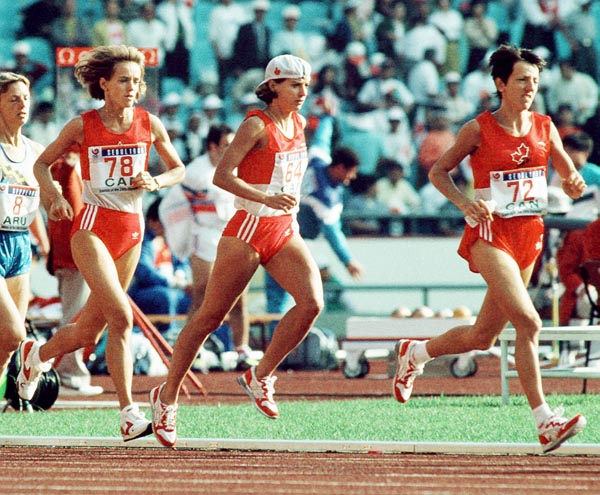 Canada's Ellen Rochefort (#78), Odette Lapierre (#72) and Lizanne Bussieres (#64) competing in the marathon event at the 1988 Olympic games in Seoul. (CP PHOTO/ COA/F.S.Grant)