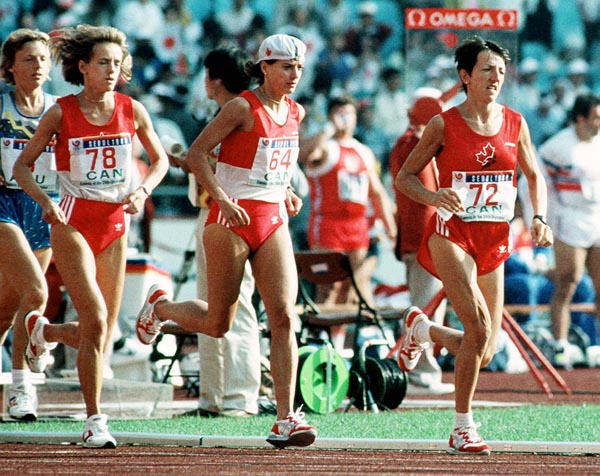 Canada's Ellen Rochefort (#78), Odette Lapierre (#72) and Lizanne Bussieres (#64) competing in the marathon event at the 1988 Olympic games in Seoul. (CP PHOTO/ COA/F.S.Grant)