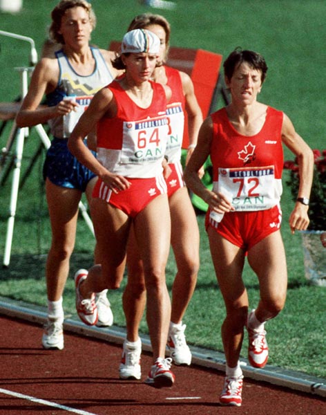 Canada's  Lizanne Bussieres (#64) and Odette Lapierre (#72) competing in the marathon  event at the 1988 Olympic games in Seoul. (CP PHOTO/ COA/F.S.Grant)