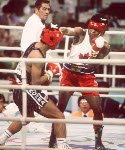 Canada's Ray Downey (left) in action against his opponent Si-Hun Park from Korea at the 1988 Olympic Games in Seoul. (CP Photo/ COA/F.S.Grant)