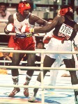 Canada's Lennox Lewis (left) in action against his opponent Riddick Bowe from the United States at the 1988 Olympic Games in Seoul. (CP Photo/ COA/S.Grant)