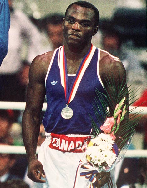 Canada's Egerton Marcus celebrates his silver medal win in the boxing event at the 1988 Olympic games in Seoul. (CP PHOTO/ COA/ Cromby McNeil)
