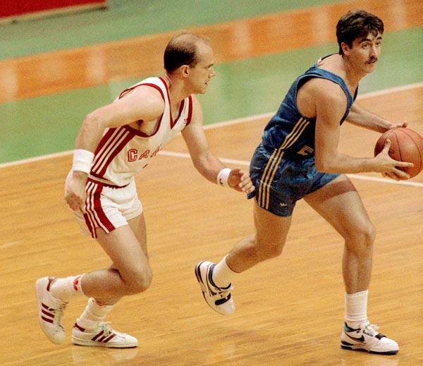 Canada's Karl Tilleman (left) competing in the basketball event at the 1988 Olympic games in Seoul. (CP PHOTO/ COA/ S. Grant)