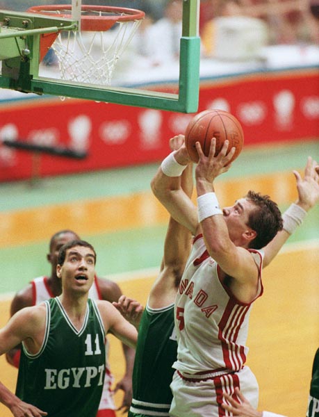 Canada's Dave Turcotte  (right) competing in the basketball event at the 1988 Olympic games in Seoul. (CP PHOTO/ COA/ S. Grant)