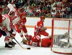 Canada's Serge Boisvert (#12) participates in the hockey event at the 1988 Winter Olympics in Calgary. (CP PHOTO/COA/S.Grant)
