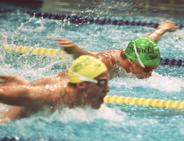 Canada's Jon Kelly (right) competing in the swimming event at the 1988 Olympic games in Seoul. (CP PHOTO/ COA/ Cromby McNeil)