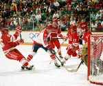 Canada's Jim Peplinski (#24) participates in the hockey event at the 1988 Winter Olympics in Calgary. (CP PHOTO/COA/S.Grant)