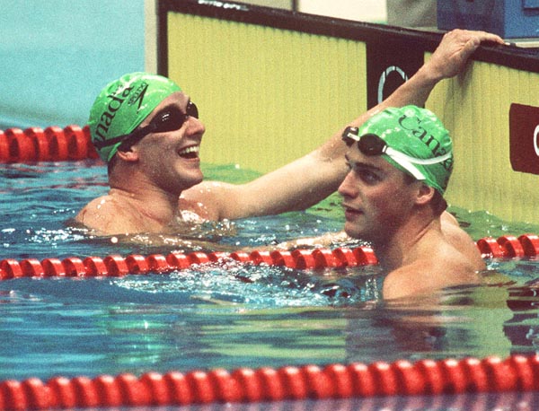 Canada's Tom Ponting (left) and Jon Kelly competing in the swimming event at the 1988 Olympic games in Seoul. (CP PHOTO/ COA/ Cromby McNeil)