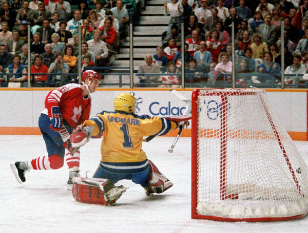 Canada's Marlin Malinowski (#16) participates in the hockey event at the 1988 Winter Olympics in Calgary. (CP PHOTO/COA/S.Grant)