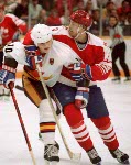 Canada's Serge Roy (#3) participates in the hockey event at the 1988 Winter Olympics in Calgary. (CP PHOTO/ COA/ S.Grant)