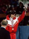 Canada's Sylvie Daigle carries the flag during the opening ceremonies at the 1992 Albertville Olympic winter Games. (CP PHOTO/COA/Ted Grant)