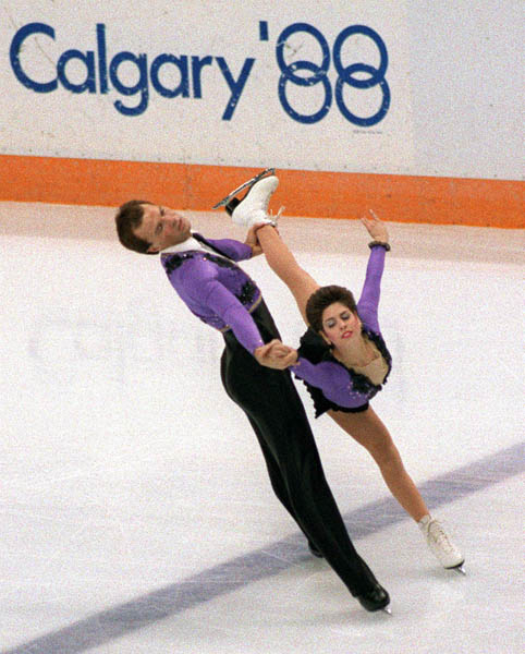 Canada's Denise Benning and Lyndon Johnston  participate in the pairs figure skating event at the 1988 Winter Olympics in Calgary. (CP PHOTO/COA/ S.Grant)
