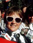 Canada's Karen Percy (right) celebrates her bronze medal win in the alpine ski event along with Silver medalist Brigitte Oertli (left) and gold medalist Alarina Kiehl (centre) at the 1988 Winter Olympics in Calgary. (CP PHOTO/ COA/C. McNeil)