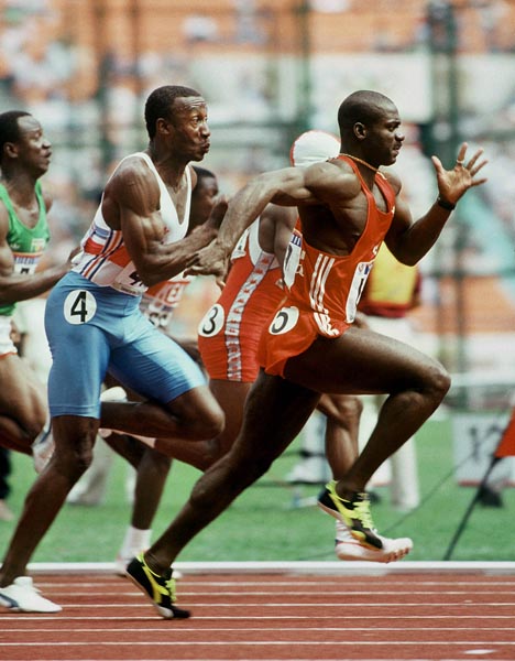 Canada's Ben Johnson and Linford Christie (#4) compete in the 100m event at the 1988 Olympic games in Seoul. (CP PHOTO/ COA/ T. O'lett)