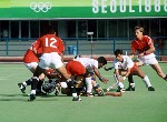 (From left to right) Canada's Pat Caruso, Ken Goodwill, Doug Harris and Pat Burrows play field hockey at the 1988 Seoul Olympic Games. (CP Photo/ COA/ T. Grant)