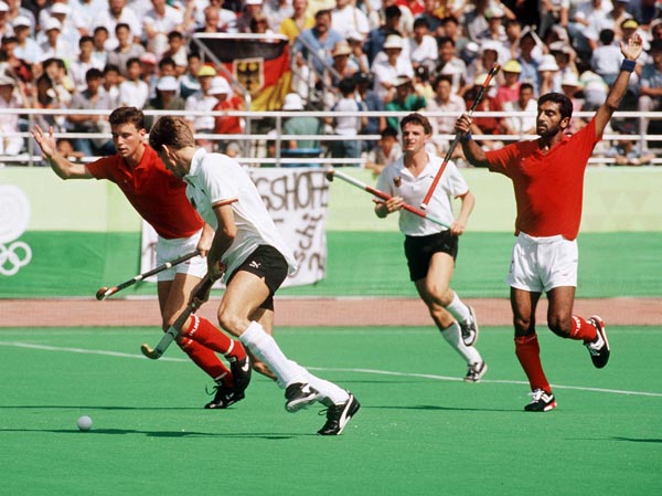 Canada's Ian Bird (left) and Hargurnek Sandhu play field hockey at the 1988 Seoul Olympic Games. (CP Photo/ COA/ T. Grant)