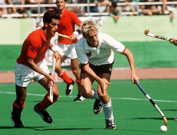 Canada's Pat Caruso (left) plays field hockey at the 1988 Seoul Olympic Games. (CP Photo/ COA/ T. Grant)