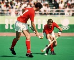Canada's Ian Bird (left) and Pat Burrows play field hockey at the 1988 Seoul Olympic Games. (CP Photo/ COA/ T. Grant)