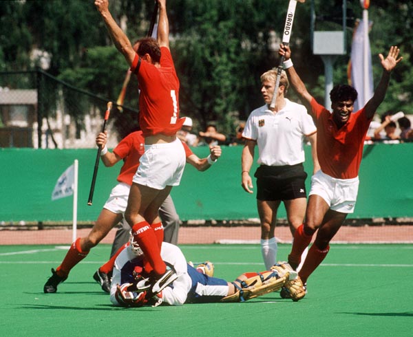 Canada's Ross Rutledge (left) and Satinder Chohan play field hockey at the 1988 Seoul Olympic Games. (CP Photo/ COA/ T. Grant)