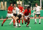 Canada's Ross Rutledge (left) and Pat Burrows (centre) play field hockey at the 1988 Seoul Olympic Games. (CP Photo/ COA/ T. Grant)