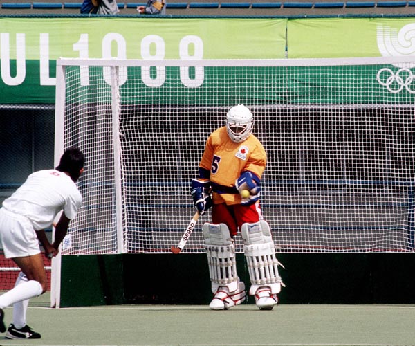 Canada's Ajay Dube (goalie) plays field hockey at the 1988 Seoul Olympic Games. (CP Photo/ COA/ T. Grant)